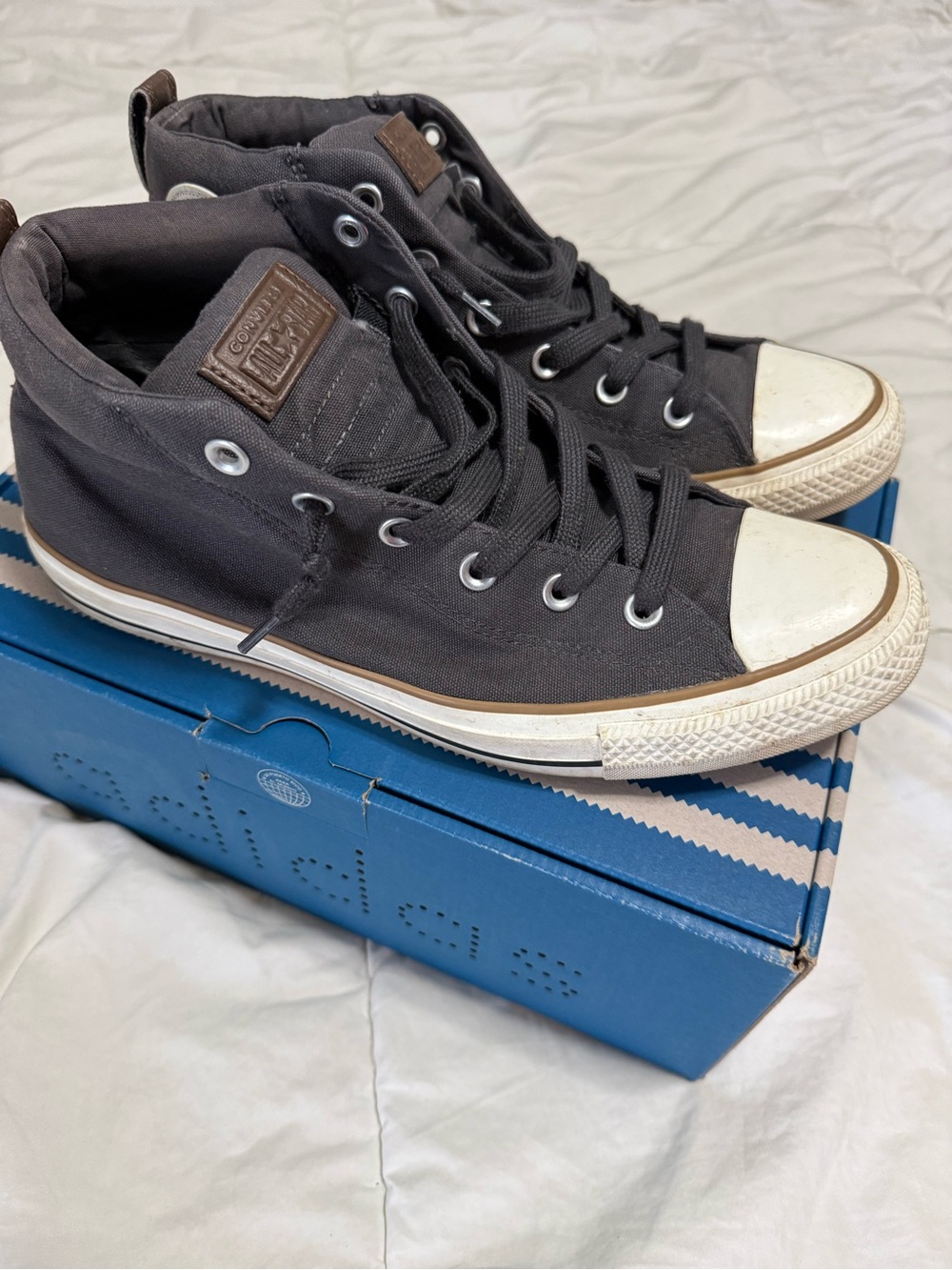 Converse Black High-Top Sneakers with White Toe Cap